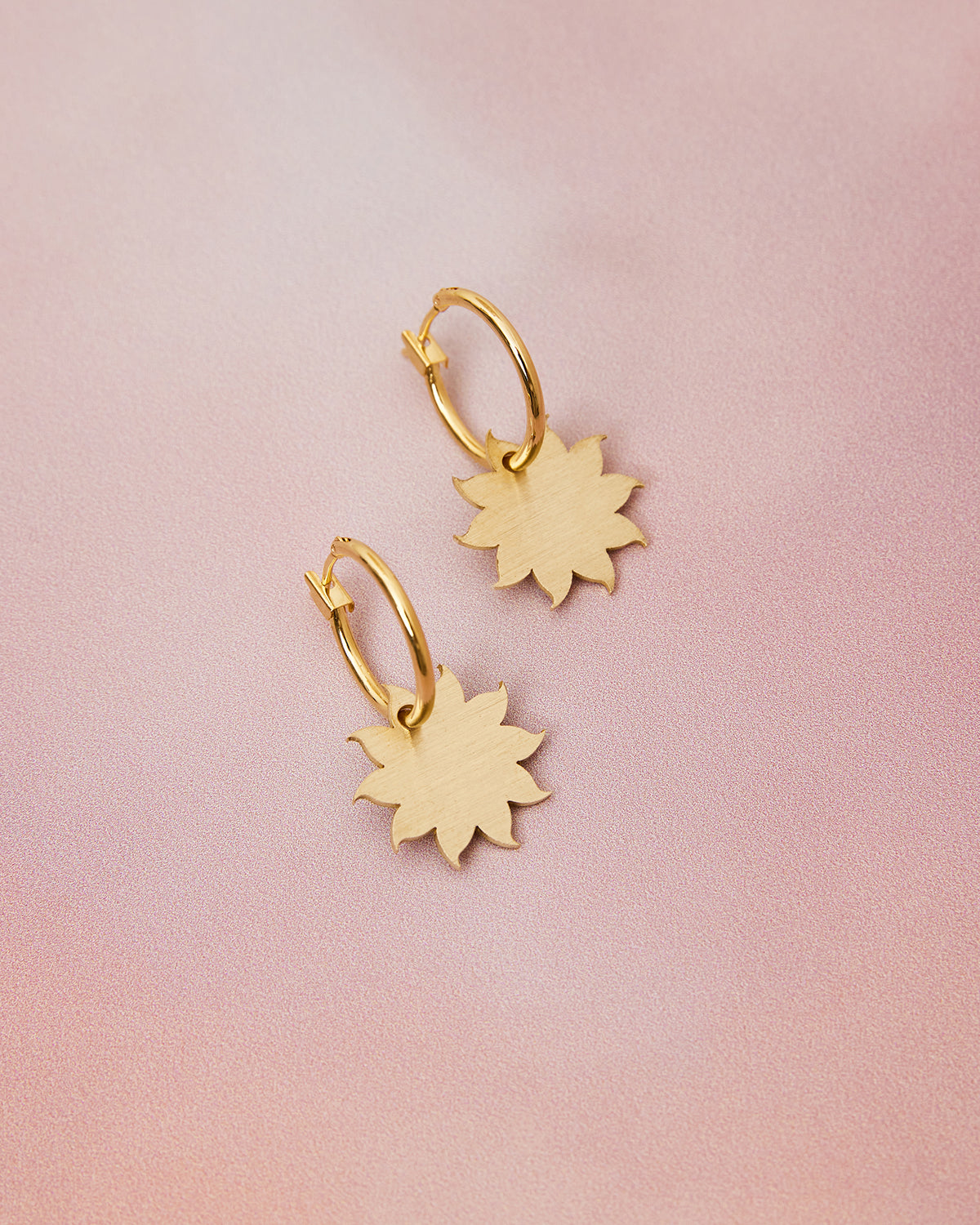 gold sun-ray hoop earrings 